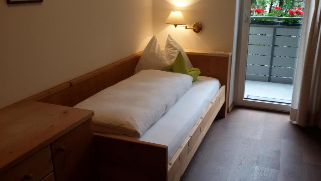 Postel nebo postele na pokoji v ubytování Garni Raffein