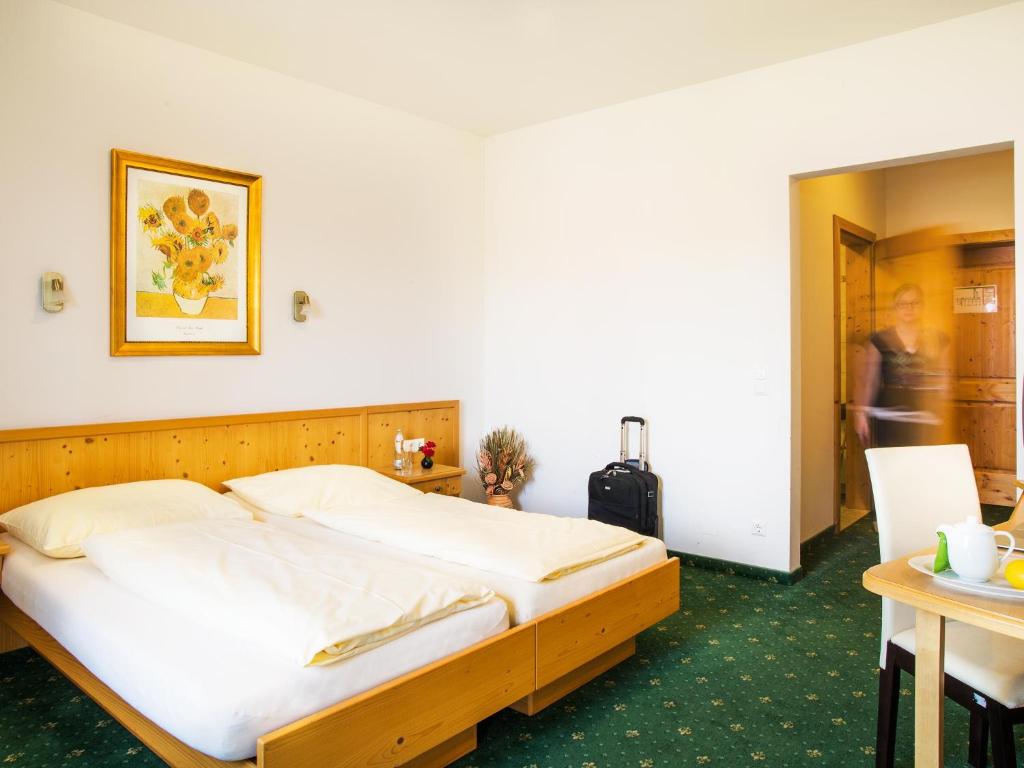 Postel nebo postele na pokoji v ubytování Landhof Steinbäck