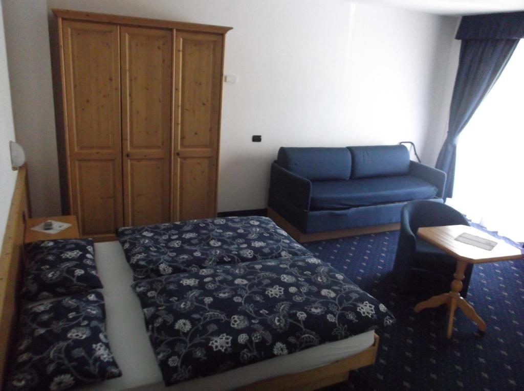 Letto o letti in una camera di Hotel Tyrolia
