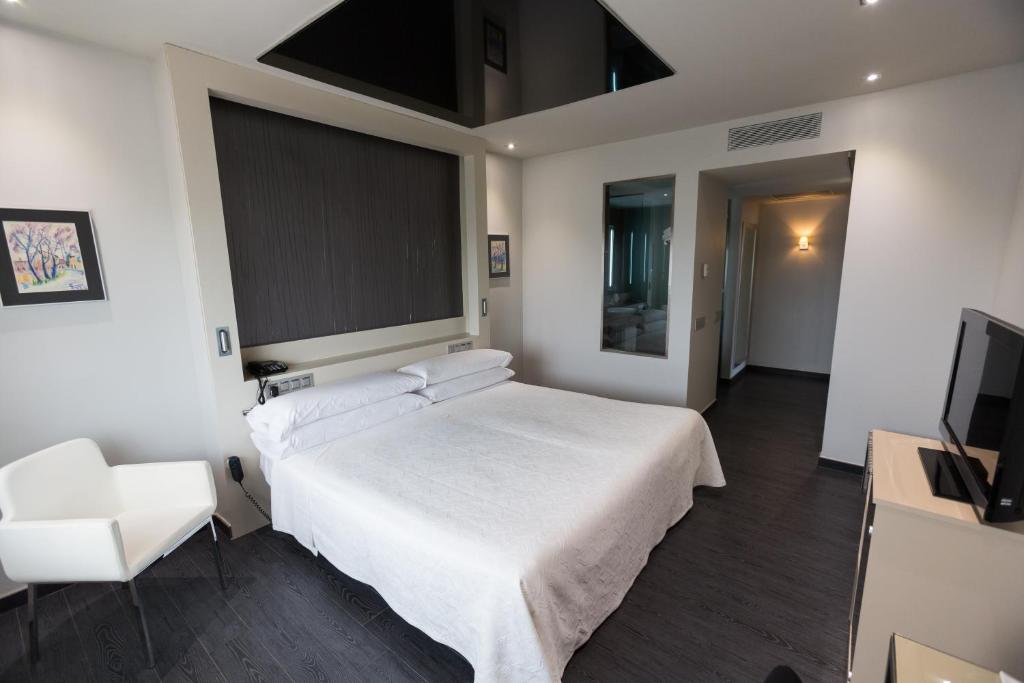 Postel nebo postele na pokoji v ubytování Felix Hotel