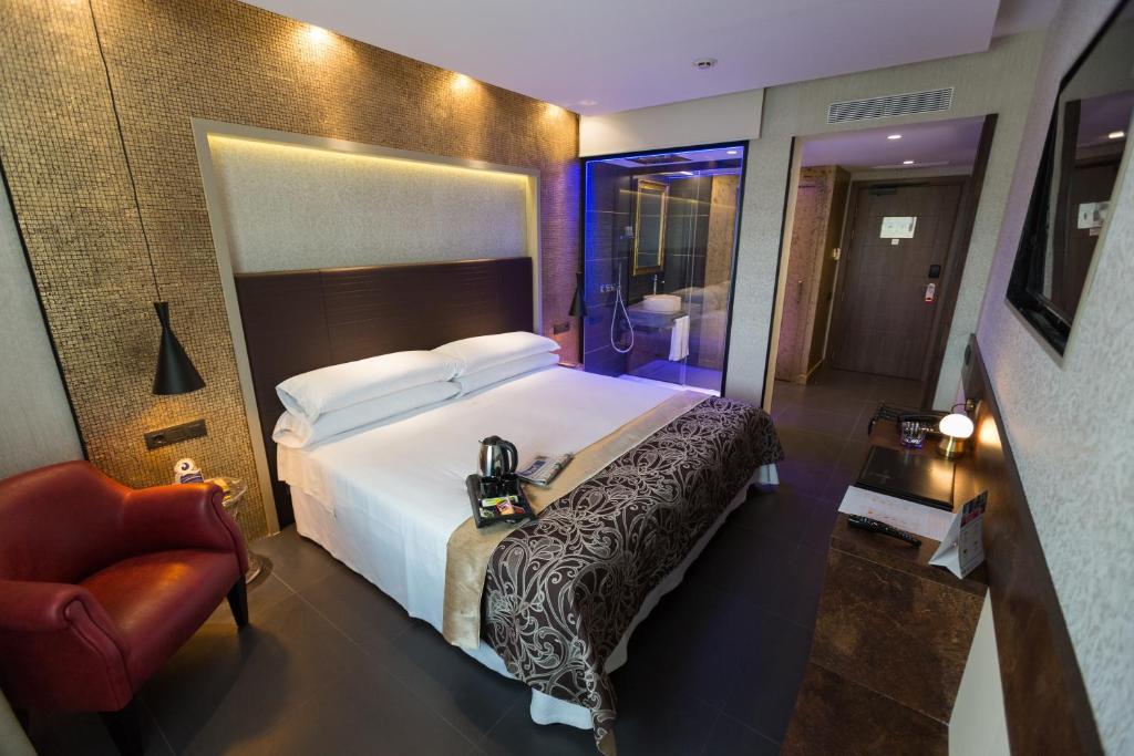 Postel nebo postele na pokoji v ubytování Felix Hotel