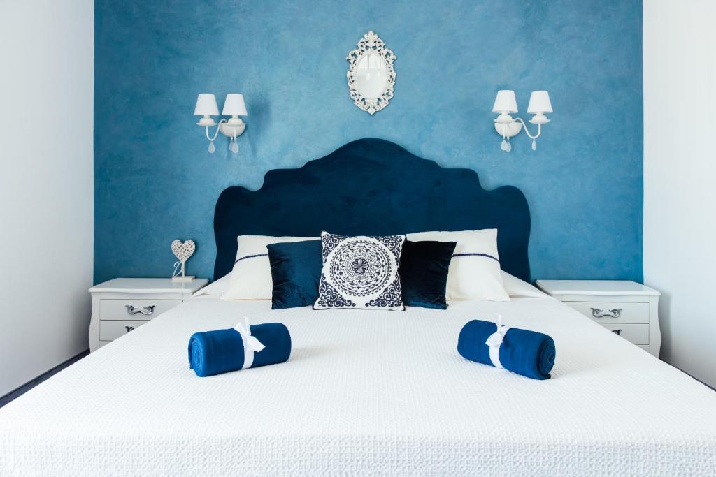 Кровать или кровати в номере Hotel Hermes Budva