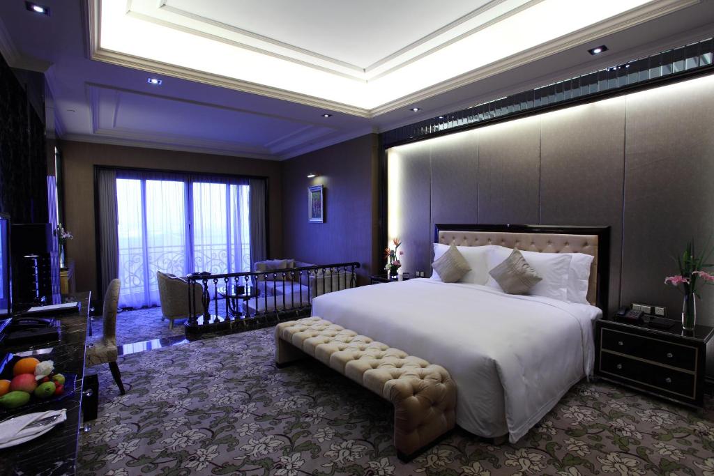 Postel nebo postele na pokoji v ubytování Chateau Star River Pudong Shanghai