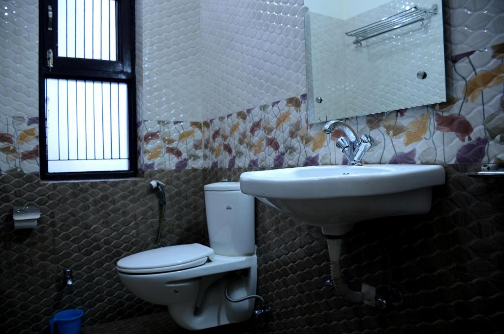 Koupelna v ubytování Mohini Home Stay