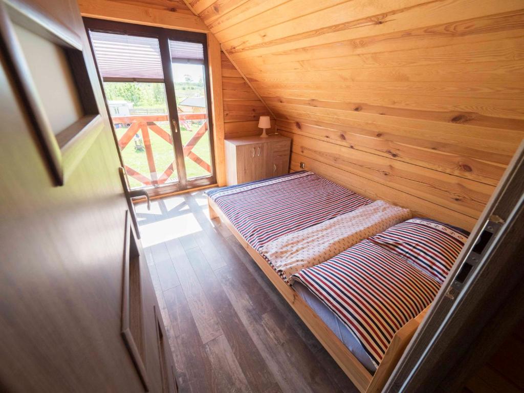 Postel nebo postele na pokoji v ubytování Siedlisko Niechorze