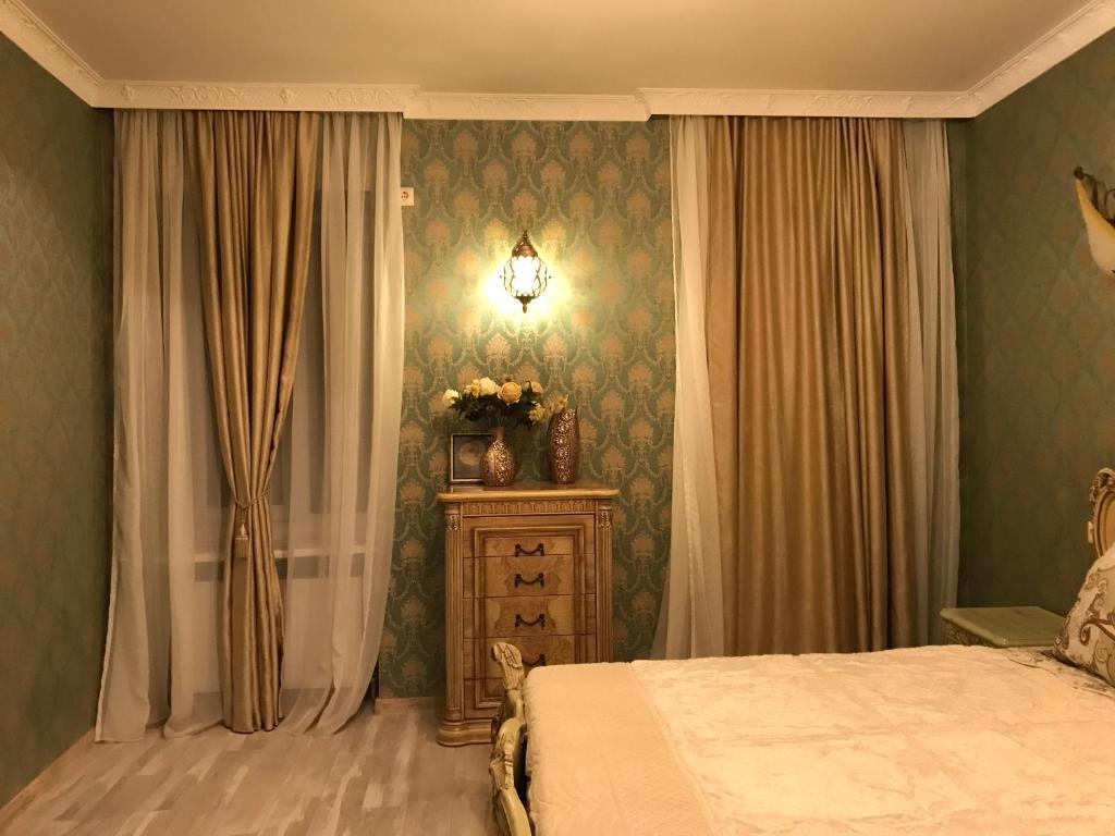 Postel nebo postele na pokoji v ubytování Old Tbilisi Gate