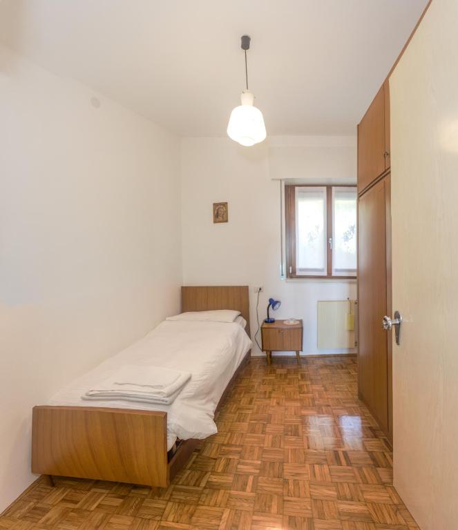 Una cama o camas en una habitación de Albergo Diffuso Balcone sul Friuli