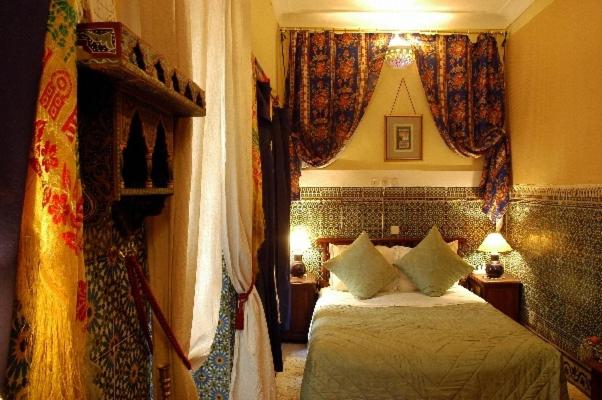 Postel nebo postele na pokoji v ubytování Riad Dalia
