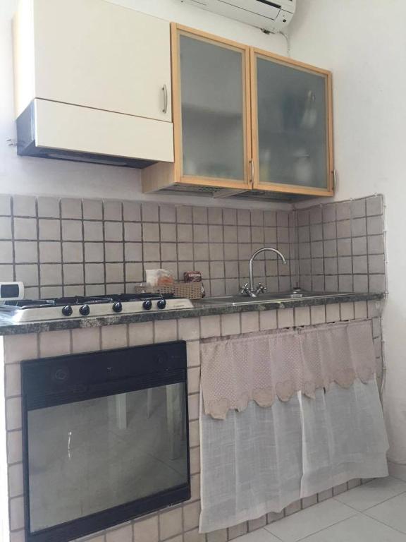 Kuchyň nebo kuchyňský kout v ubytování Fantasy House Ischia