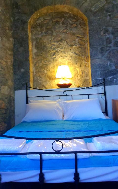 Postel nebo postele na pokoji v ubytování Villa Castello