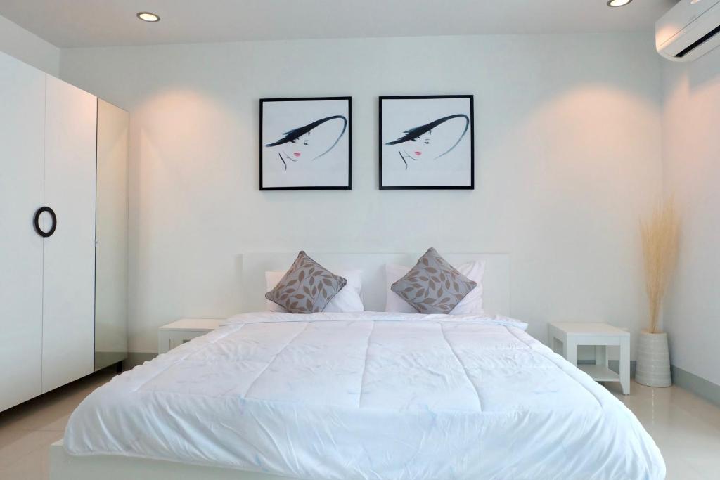 Postel nebo postele na pokoji v ubytování DewyHouse