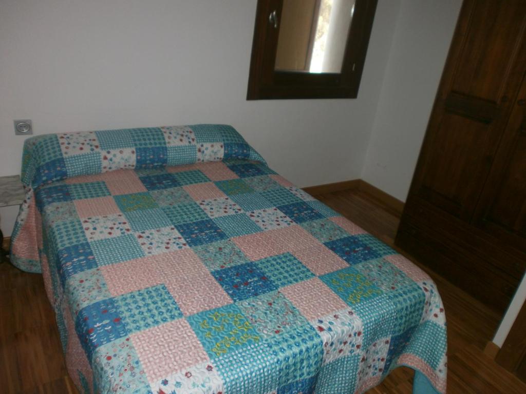 Postel nebo postele na pokoji v ubytování Albergue Coto Real de la Marina