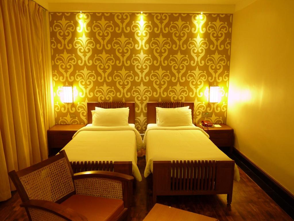 Postel nebo postele na pokoji v ubytování Grand Hotel
