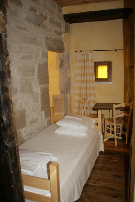 Säng eller sängar i ett rum på Chambres d'Hôtes de La Vallée Du Serein