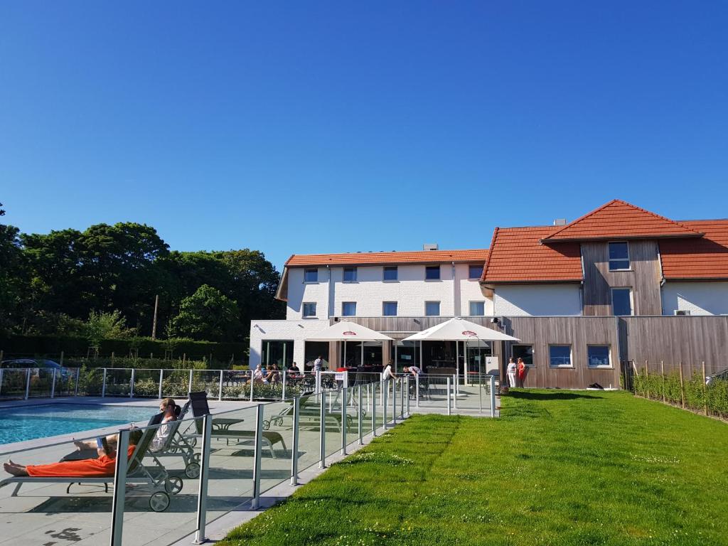 Bazén v ubytování ibis De Haan nebo v jeho okolí