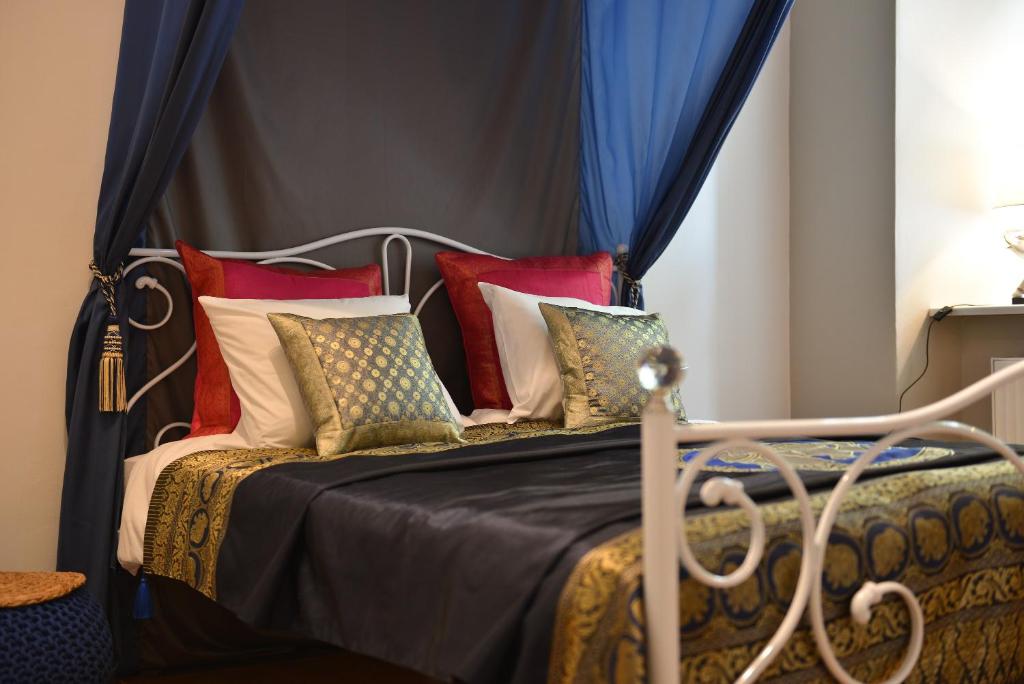 Voodi või voodid majutusasutuse La Gioia Magic Orient Apartments toas