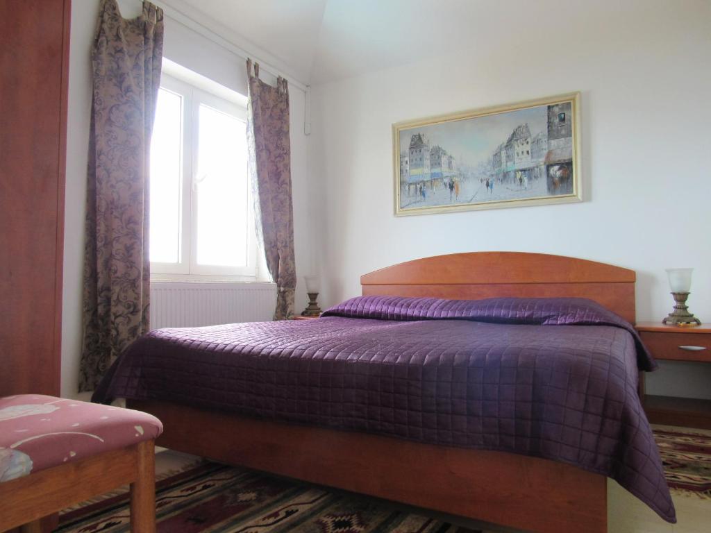 Łóżko lub łóżka w pokoju w obiekcie Apartments Villa Palme
