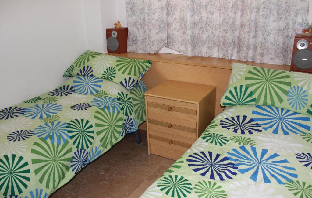 Posteľ alebo postele v izbe v ubytovaní Apartamento Edificio Diamant