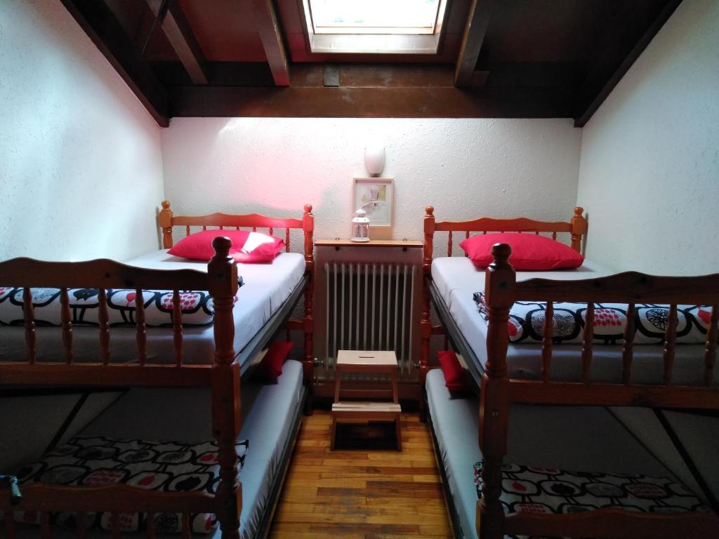 Postel nebo postele na pokoji v ubytování Refugio La Ardilla Real