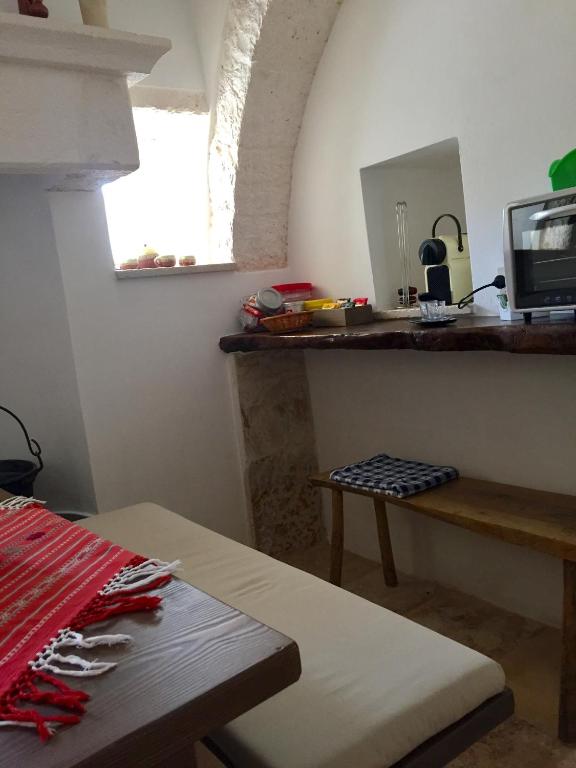 Kuchyň nebo kuchyňský kout v ubytování Trulli di Pozzomasiello