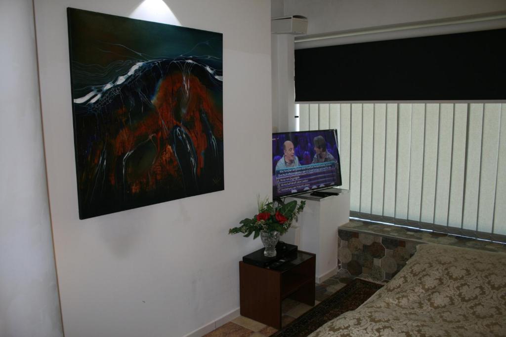 TV a/nebo společenská místnost v ubytování Das Hanse Quartier