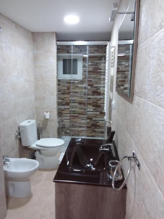 Kúpeľňa v ubytovaní Apartamentos Naranja y Limòn