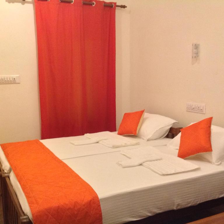 Postel nebo postele na pokoji v ubytování Cherai Onetree Retreat