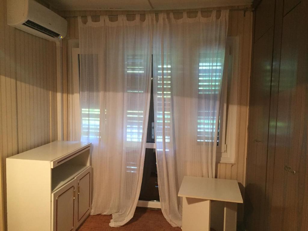 Kuchyň nebo kuchyňský kout v ubytování Pálma Apartmanház Siófok