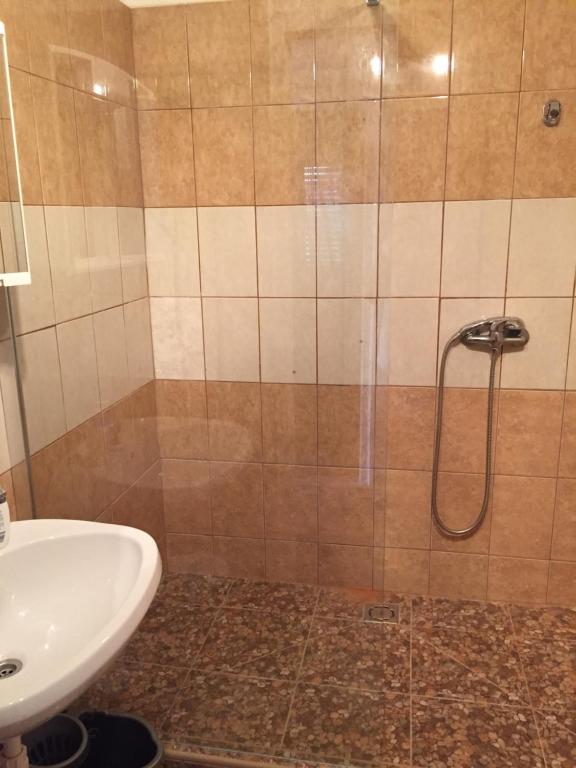 Koupelna v ubytování Pálma Apartmanház Siófok