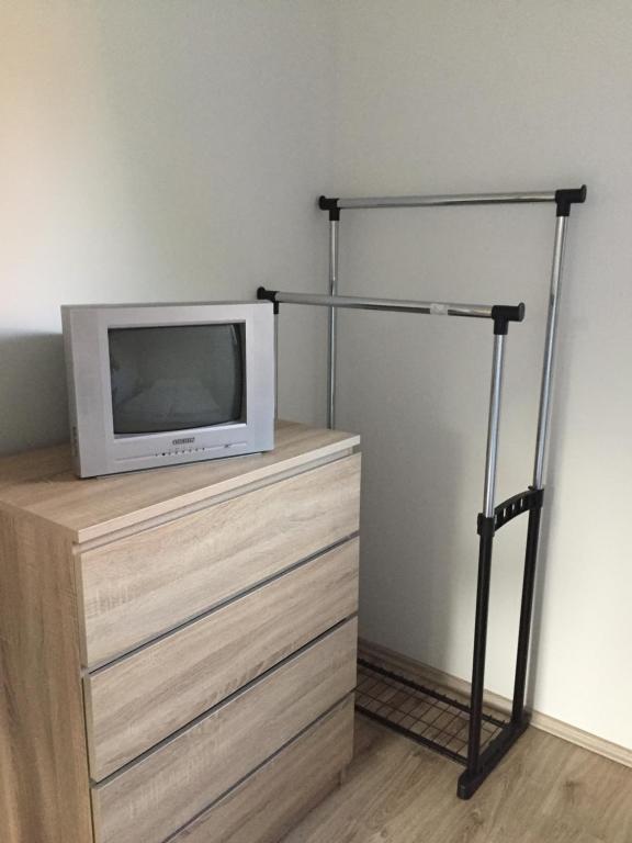 TV a/nebo společenská místnost v ubytování Pálma Apartmanház Siófok
