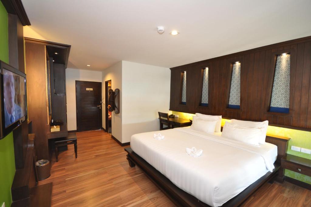 Postel nebo postele na pokoji v ubytování Chalelarn Hotel Hua Hin
