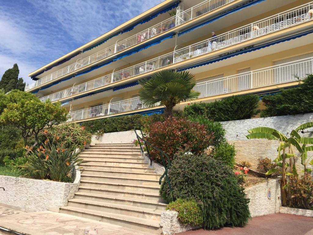 a building with stairs in front of it at Villa Bellochio in Menton