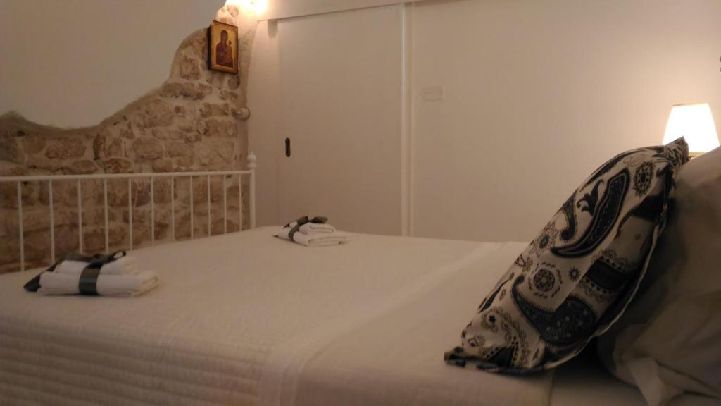 Postel nebo postele na pokoji v ubytování Il Sottano del Conte