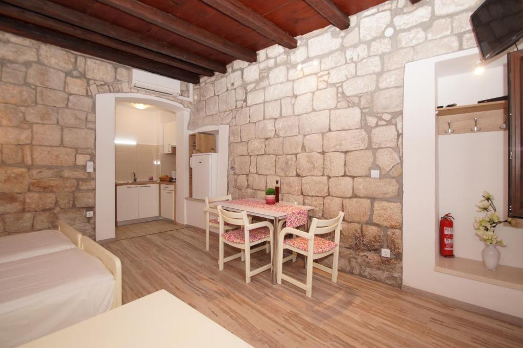 Posteľ alebo postele v izbe v ubytovaní Apartment Chupa