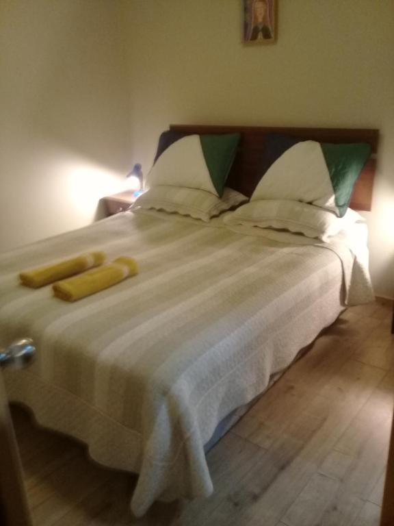 Postel nebo postele na pokoji v ubytování Hostal Maria Casa