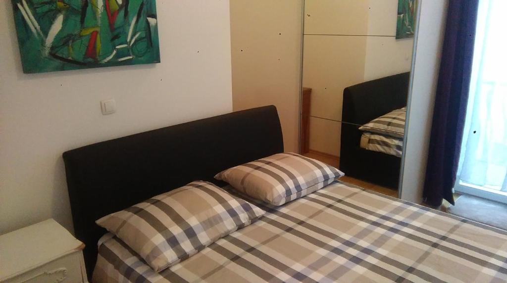 Posteľ alebo postele v izbe v ubytovaní Centar Split Apartments Manuš