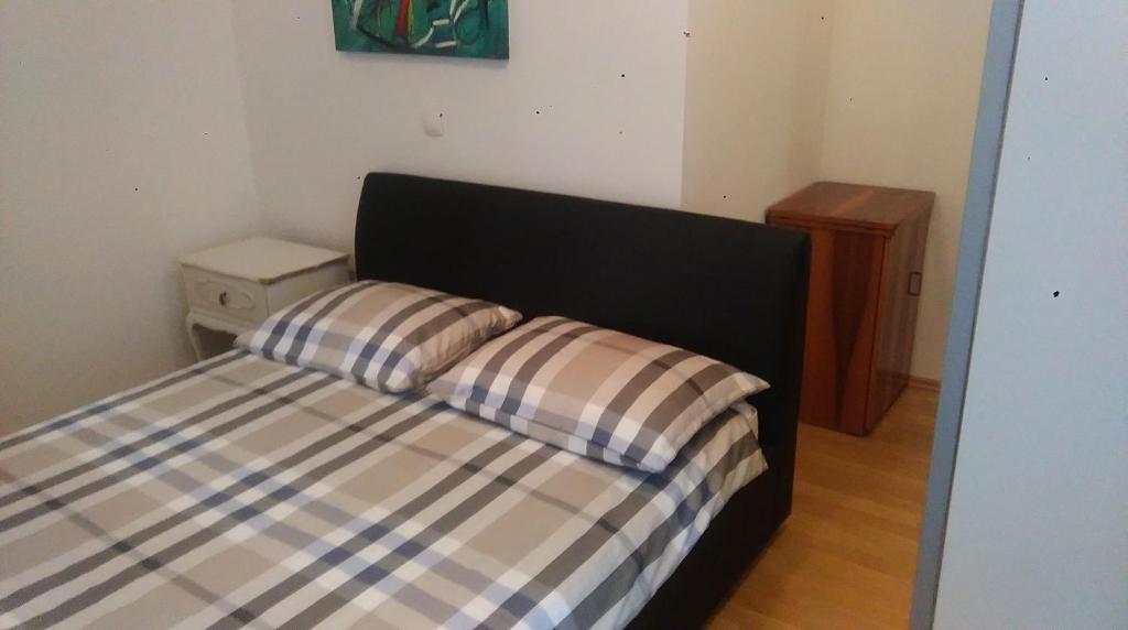Posteľ alebo postele v izbe v ubytovaní Centar Split Apartments Manuš