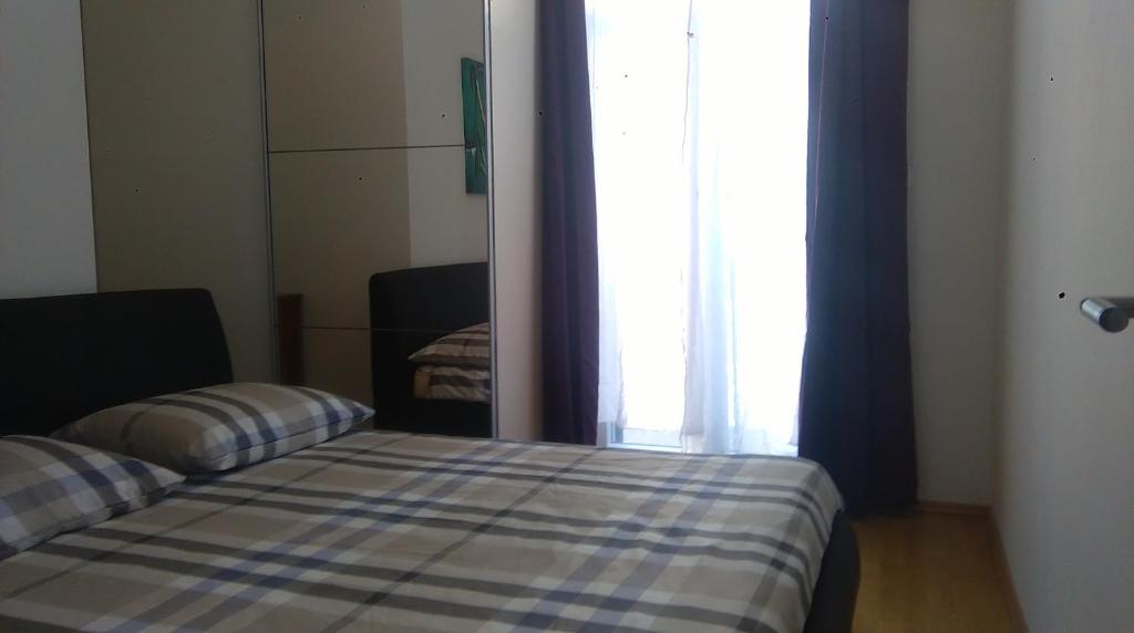 Posteľ alebo postele v izbe v ubytovaní Centar Split Apartments Manuš