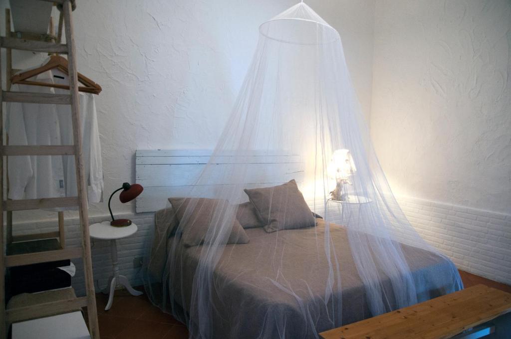 A bed or beds in a room at Addumari
