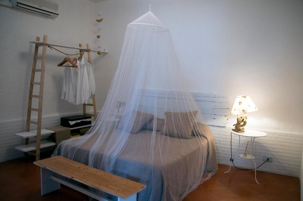 A bed or beds in a room at Addumari