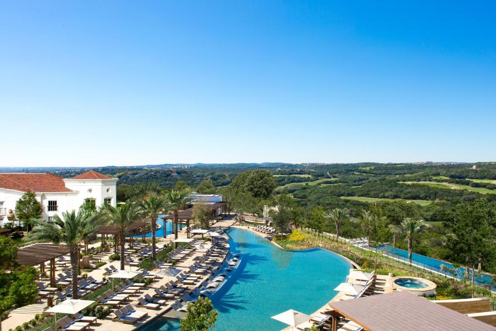 an aerial view of the pool at a resort at La Cantera Resort & Spa in San Antonio