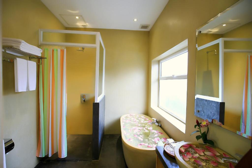Postel nebo postele na pokoji v ubytování Chheng Residence