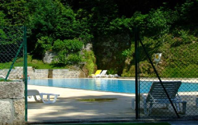 Bazén v ubytování Hotel Das Termas nebo v jeho okolí