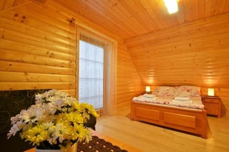 Postel nebo postele na pokoji v ubytování Luxdomki