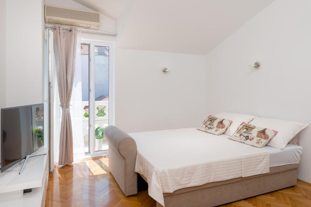Posteľ alebo postele v izbe v ubytovaní Spalato Dream Apartmants