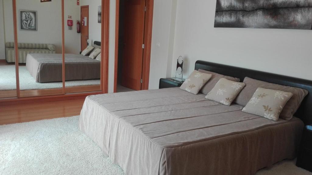 Postel nebo postele na pokoji v ubytování Quarto/Suite de Charme