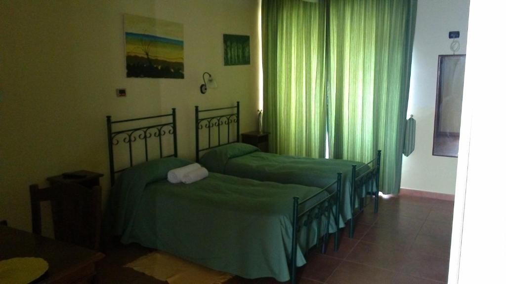 Krevet ili kreveti u jedinici u okviru objekta B&B Le Stanze del Sogno