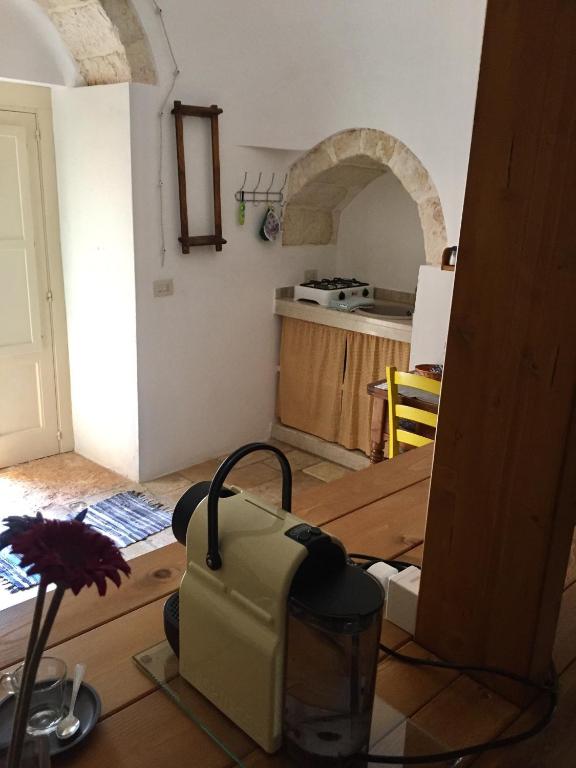 Kuchyň nebo kuchyňský kout v ubytování Trulli di Pozzomasiello