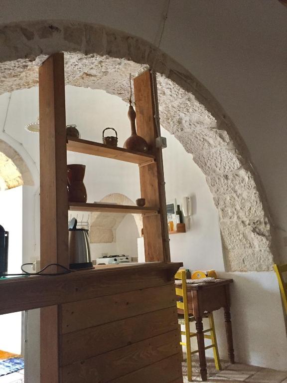 Kuchyň nebo kuchyňský kout v ubytování Trulli di Pozzomasiello