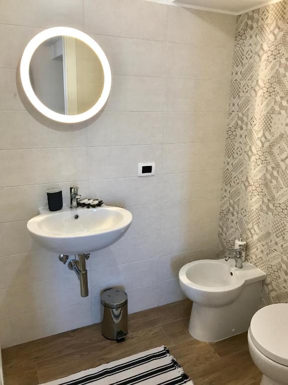 Koupelna v ubytování La Terra dei Mari Room & Relax